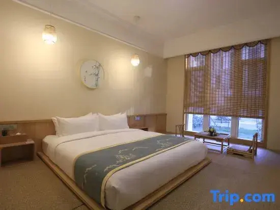 Gloria Plaza Hotel Qingdao - Chambres