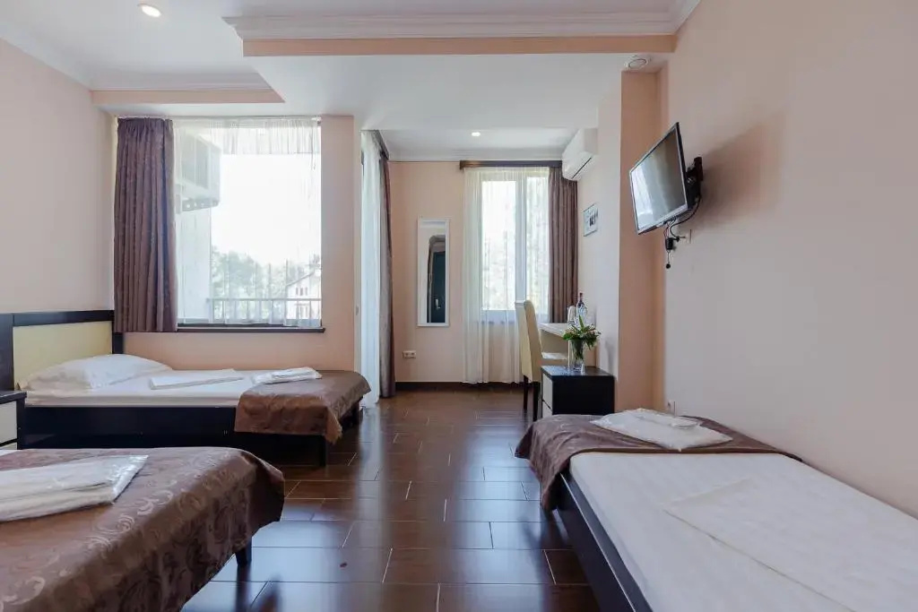 GNS Hotel - Chambres