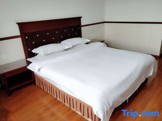 Двухместный номер Business двуспальная кровать в Dongshi Hotel (Changchun Jingyue)