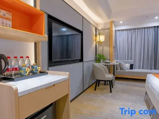 Huidong Hotel Zigong - Chambres