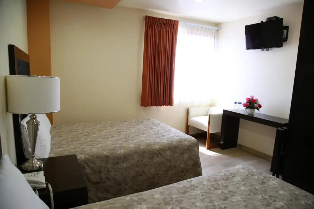 Hotel Plaza Bernal - Chambres