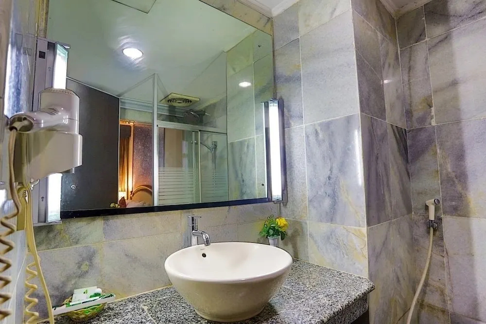 Johns Pardede International Hotel - Chambres
