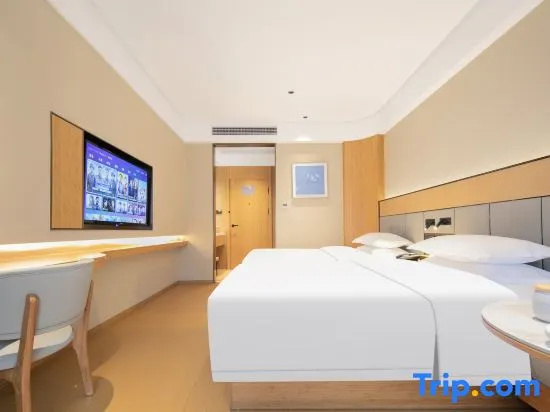 Qingxin Hotel - Chambres