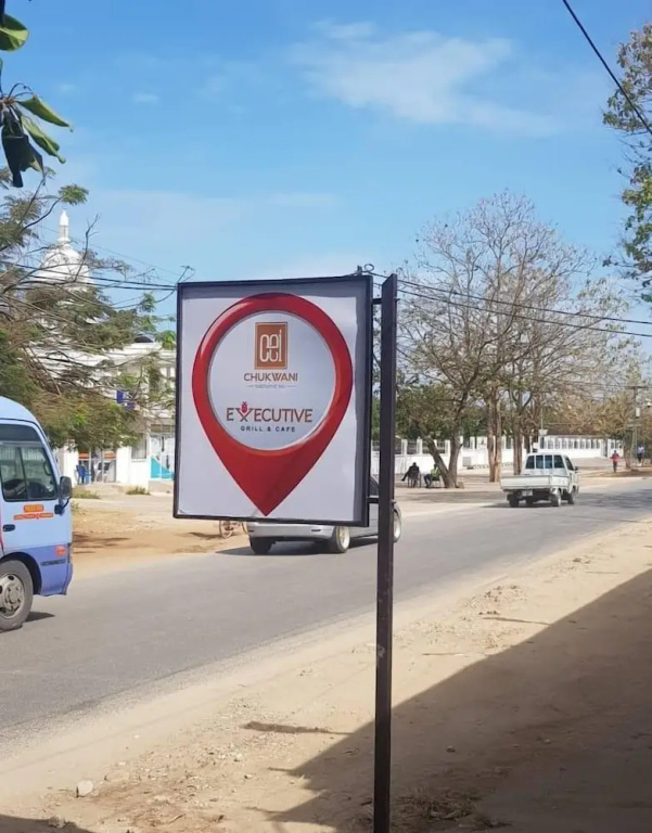 Chukwani Executive Inn - Chambres