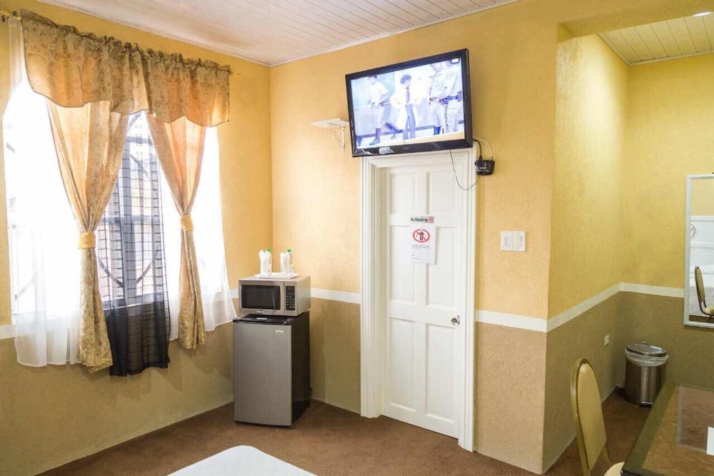 Millenium Manor Hotel - Chambres