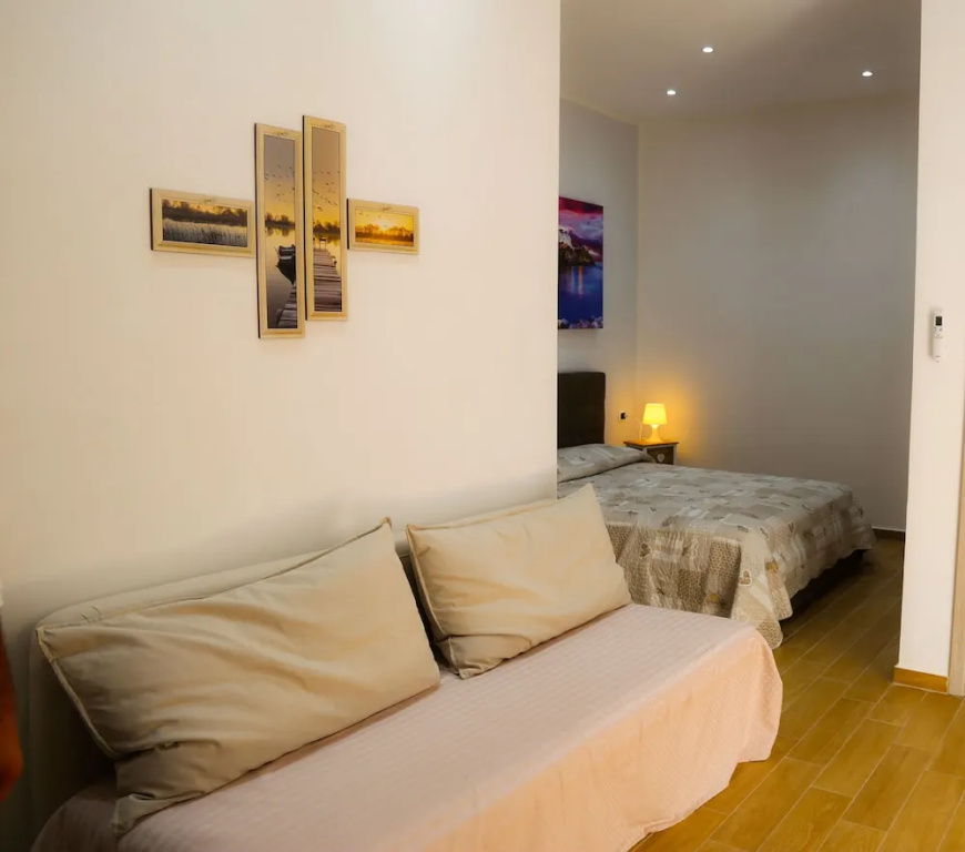 Standard Quadruple room with balcony and with city view