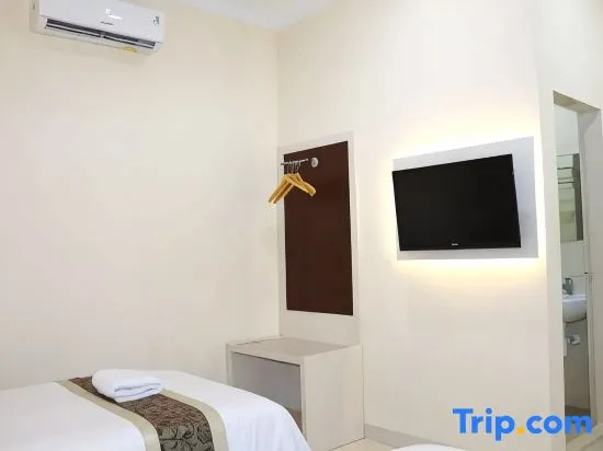 Griya Hotel - Chambres
