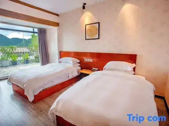 Yiya Holiday Inn - Chambres