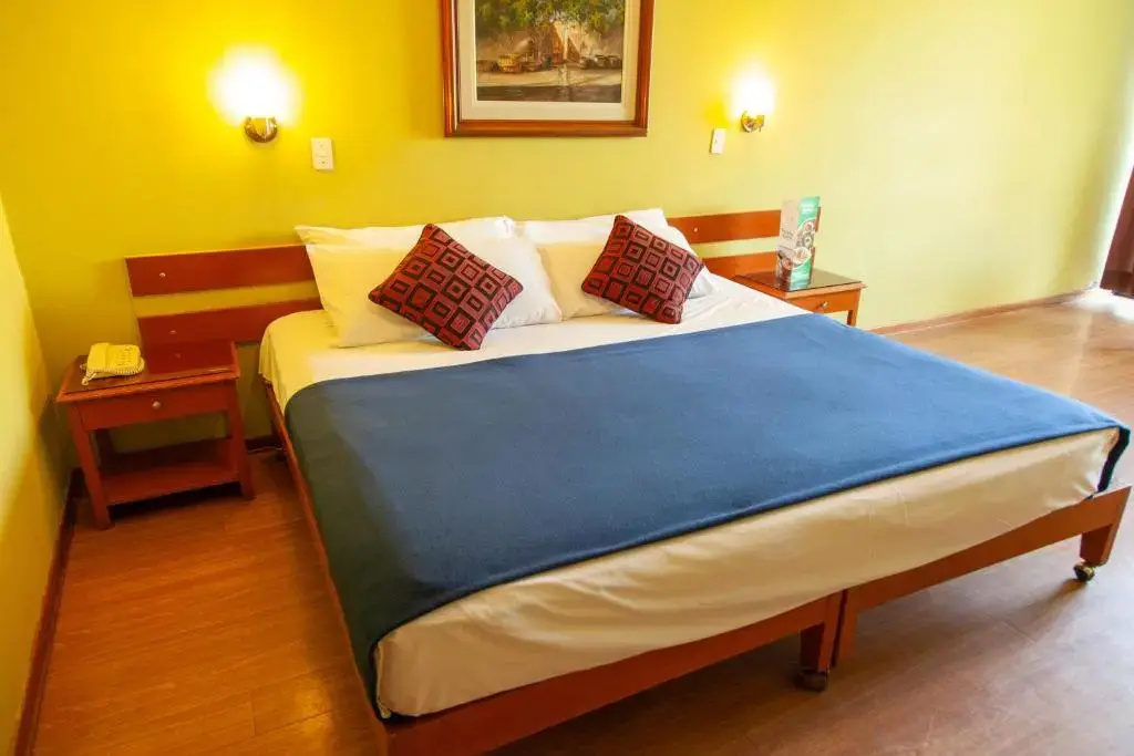 Hotel Holiday Suites - Chambres