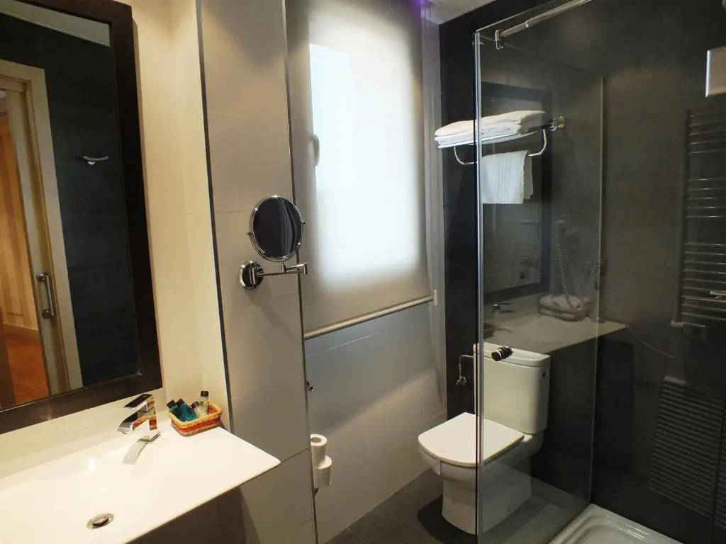 Hotel Puerta Del Arco - Chambres