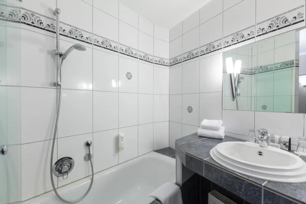 Sport - und Tagungshotel De Poort - Chambres