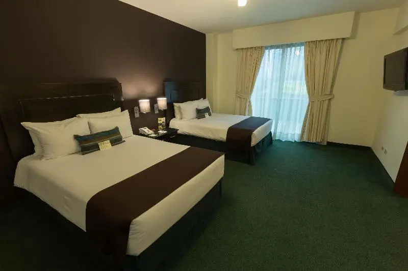 El Polo Hotel & Suites - Chambres