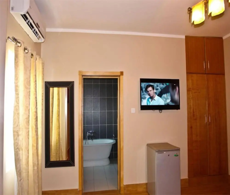 Tropical Enclave Hotel - Chambres
