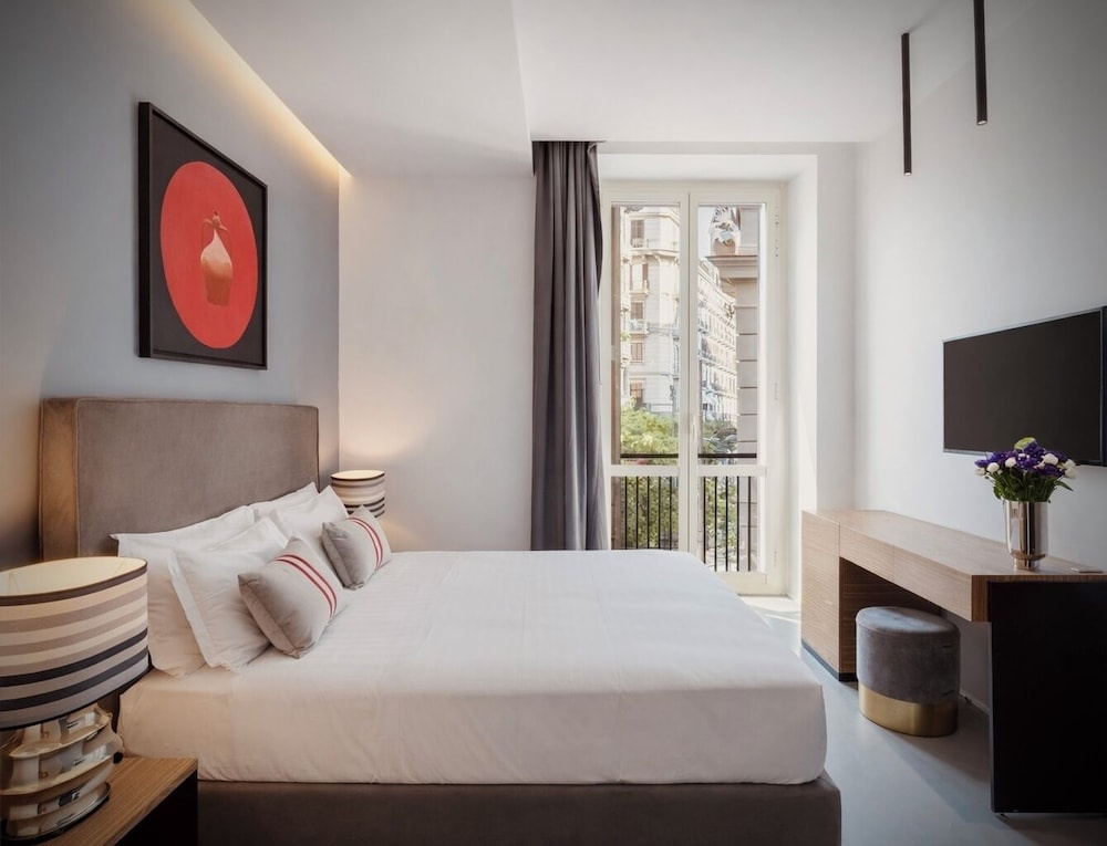 Comfort room with balcony and with partial sea view