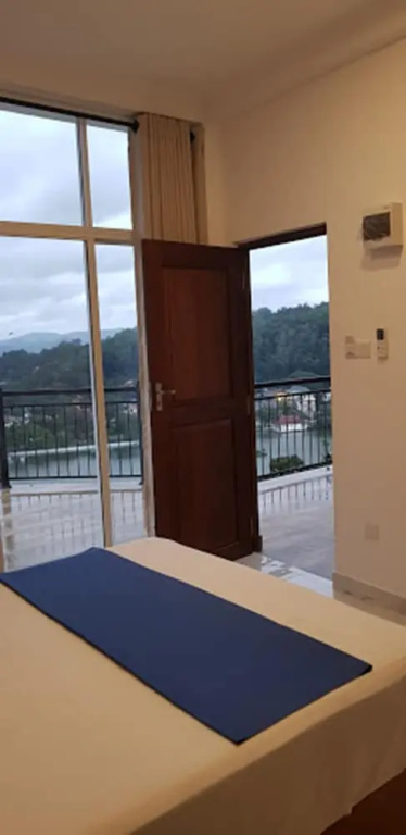 Standard Double room with balcony and with lake view (full double bed)