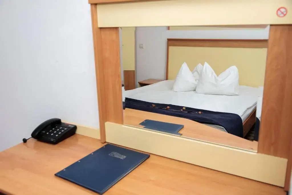 Plus Hotel - Chambres