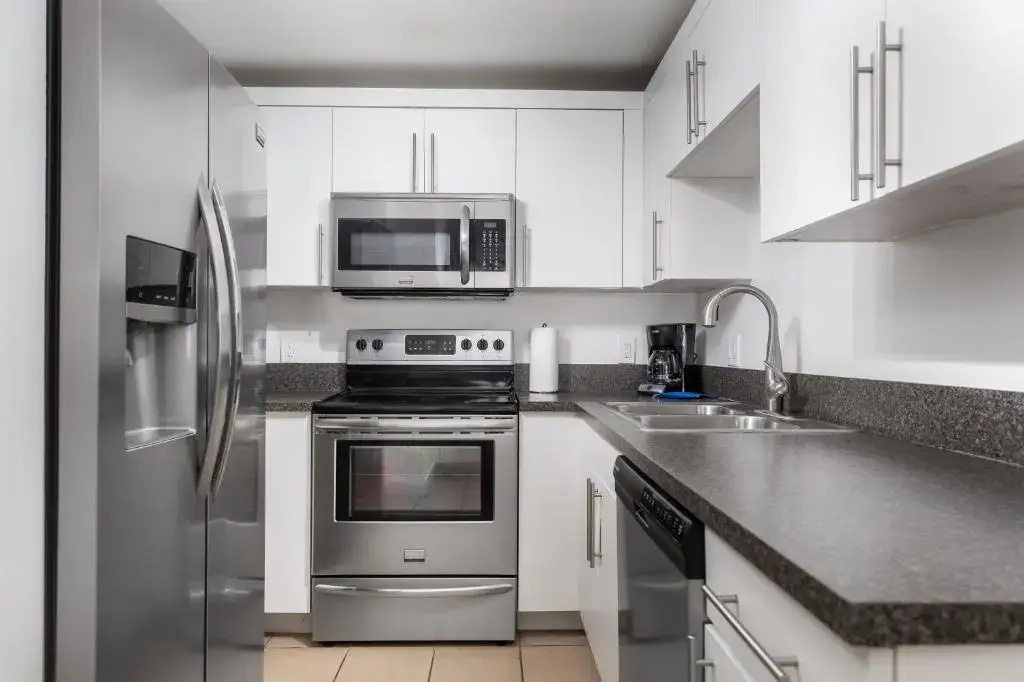 Fortune House Hotel Suites - Chambres
