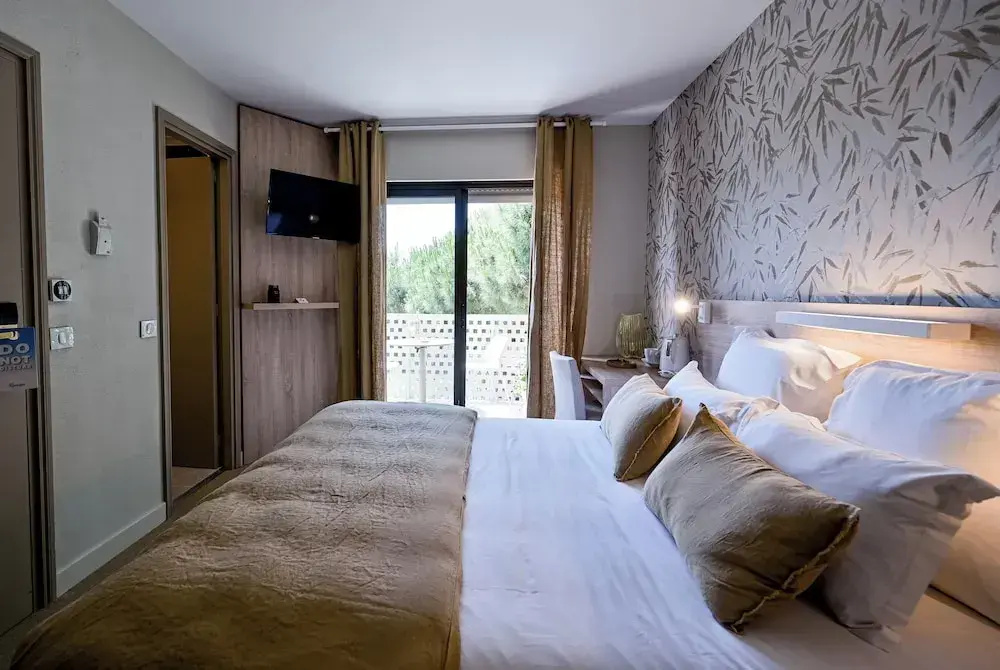Voir la photo 2 — Hôtel La Ménado