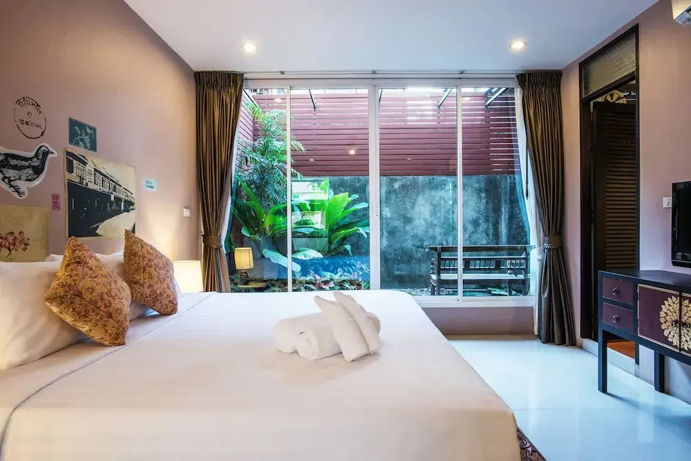 Семейный люкс в Feung Nakorn Balcony Rooms and Cafe