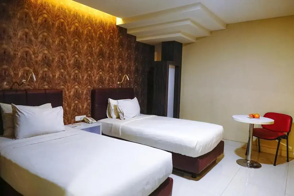 Empress Hotel Makassar - Chambres