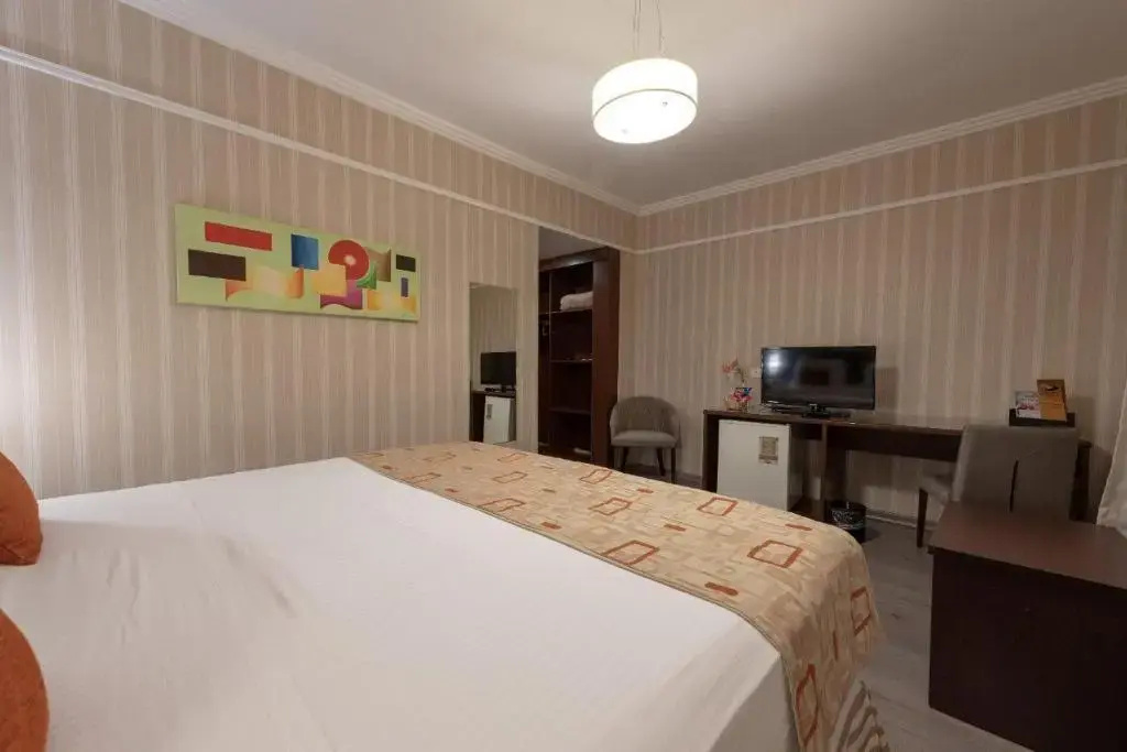 Class Hotel Guaxupé - Chambres