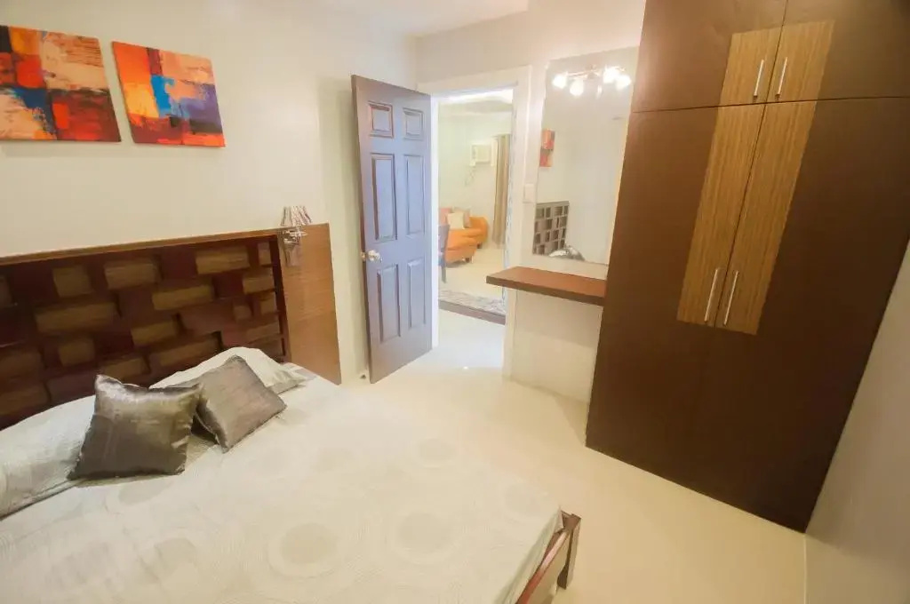 NF Suites - Chambres
