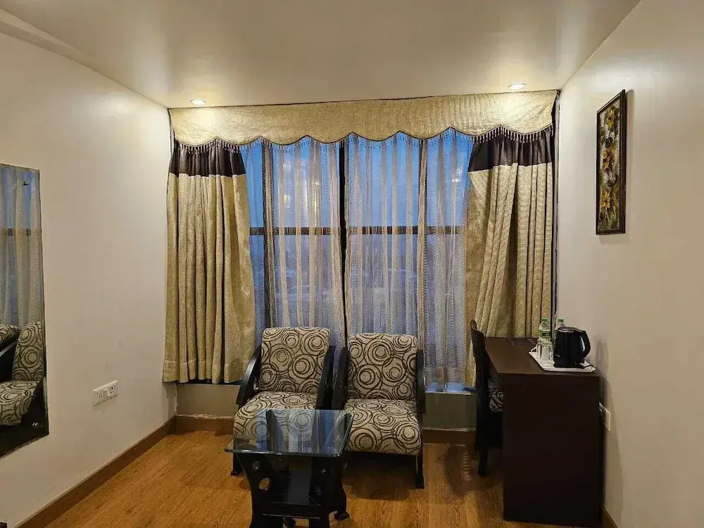 Hotel Saptagiri - Chambres