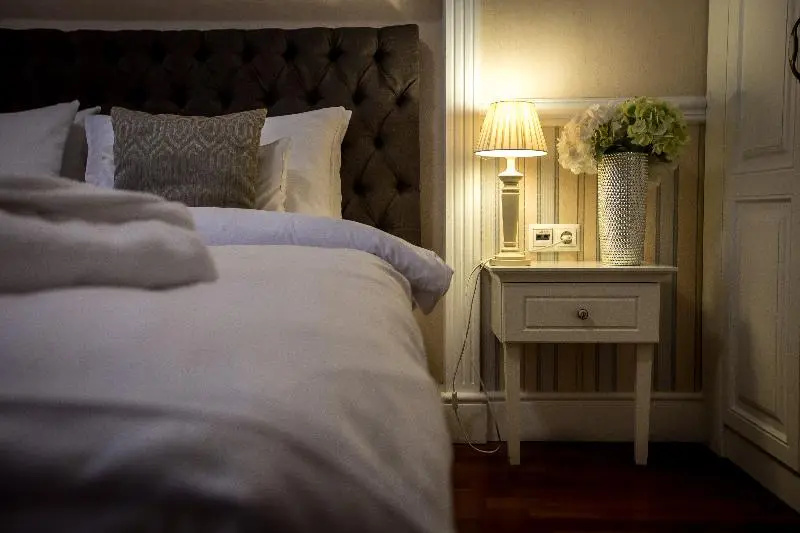 Queen's Court Hotel & Residence - Chambres