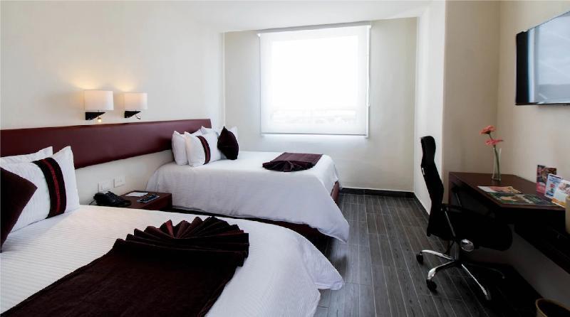 Двухместный номер Preferential 2 отдельные кровати в Hotel Misión Puebla Angelopolis