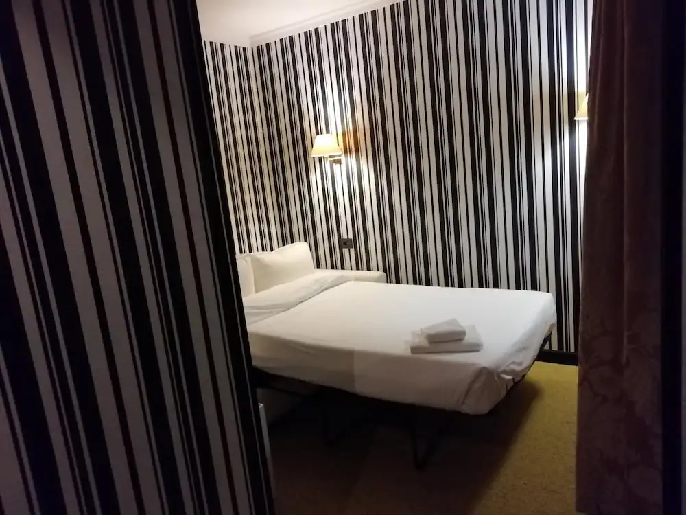 Hotel Clarín - Chambres