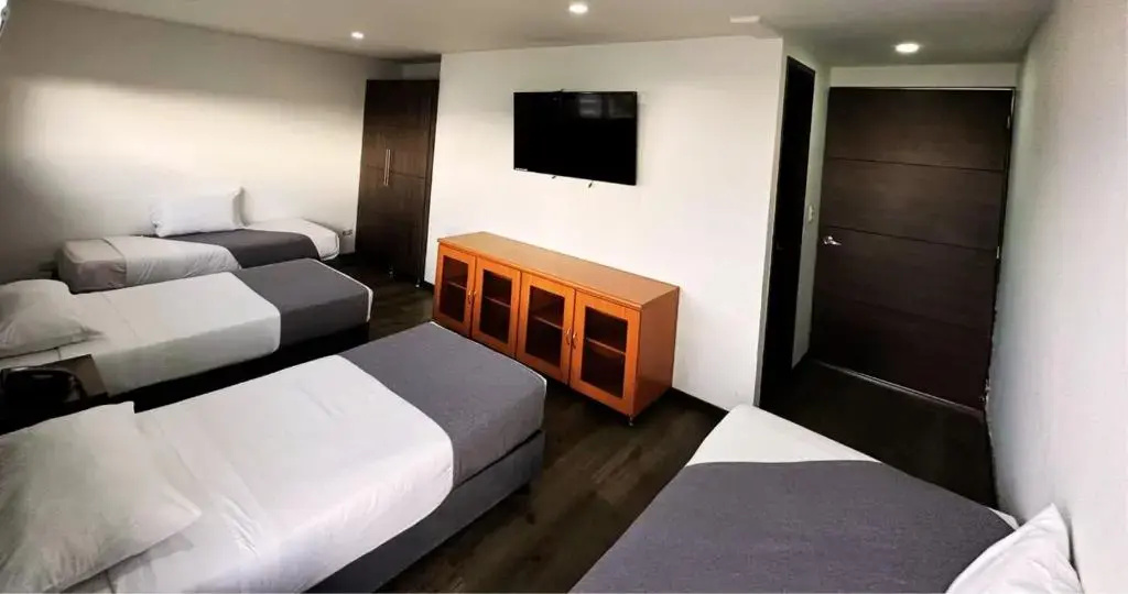 Expo Hotel Ferial - Chambres