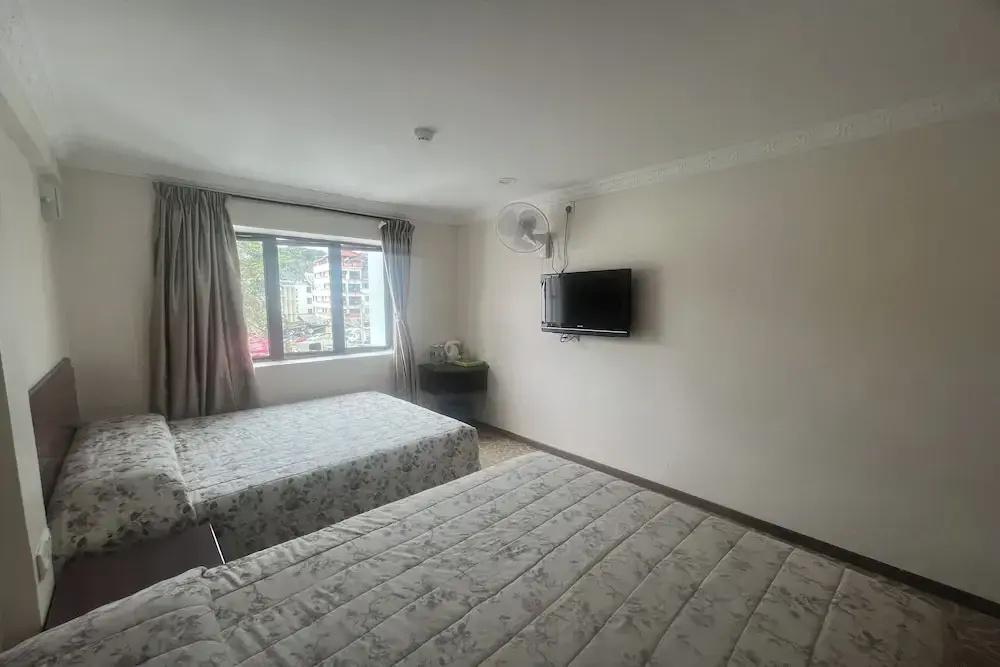 Deluxe Quadruple room with balcony