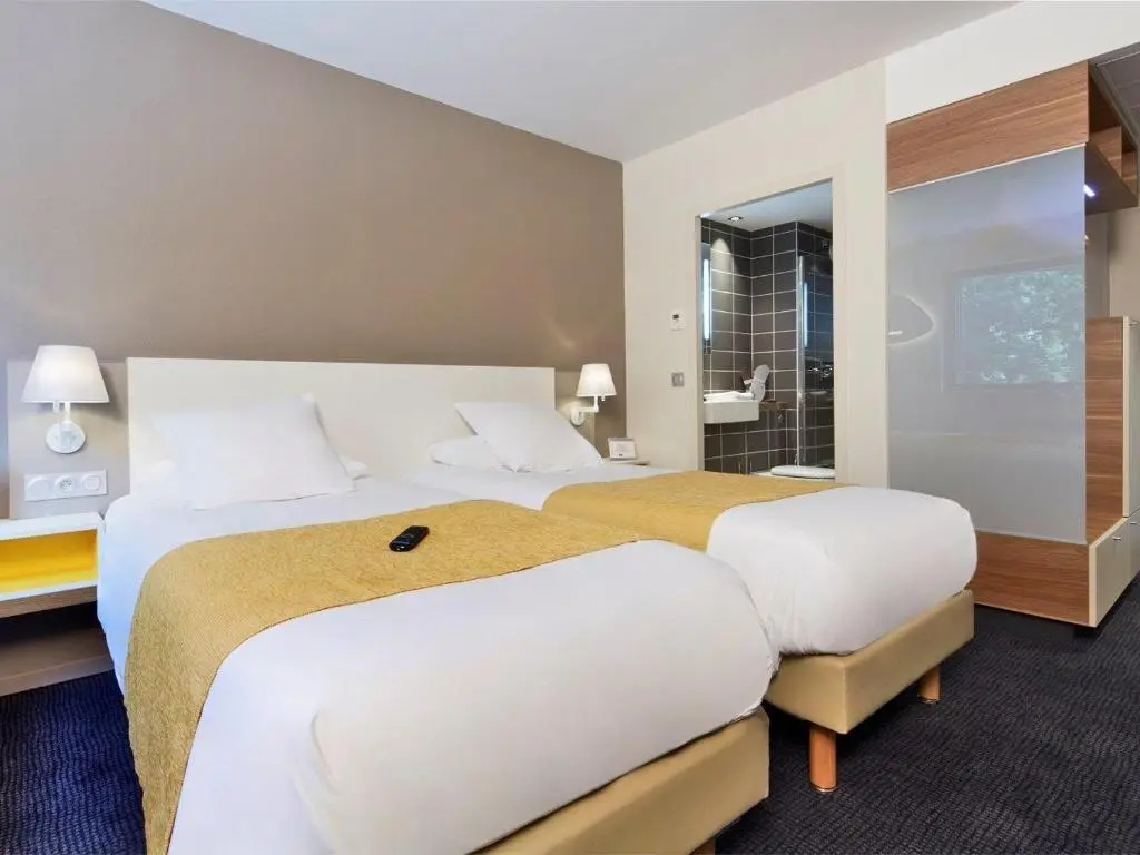 Kyriad Prestige Pau - Zenith - Palais Des Sports - Chambres