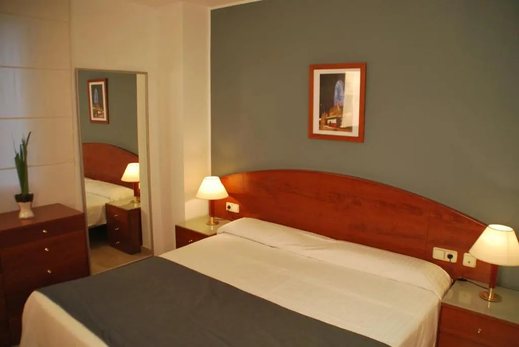 Aparthotel Napols - Chambres