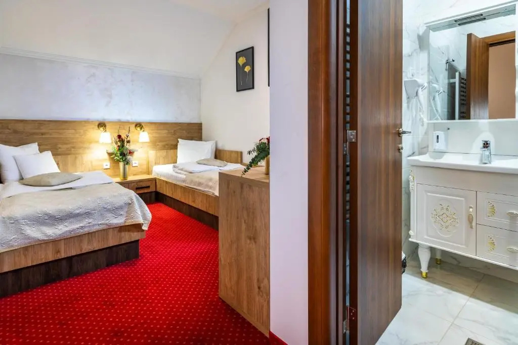 Garni Hotel Royal Crown - Chambres