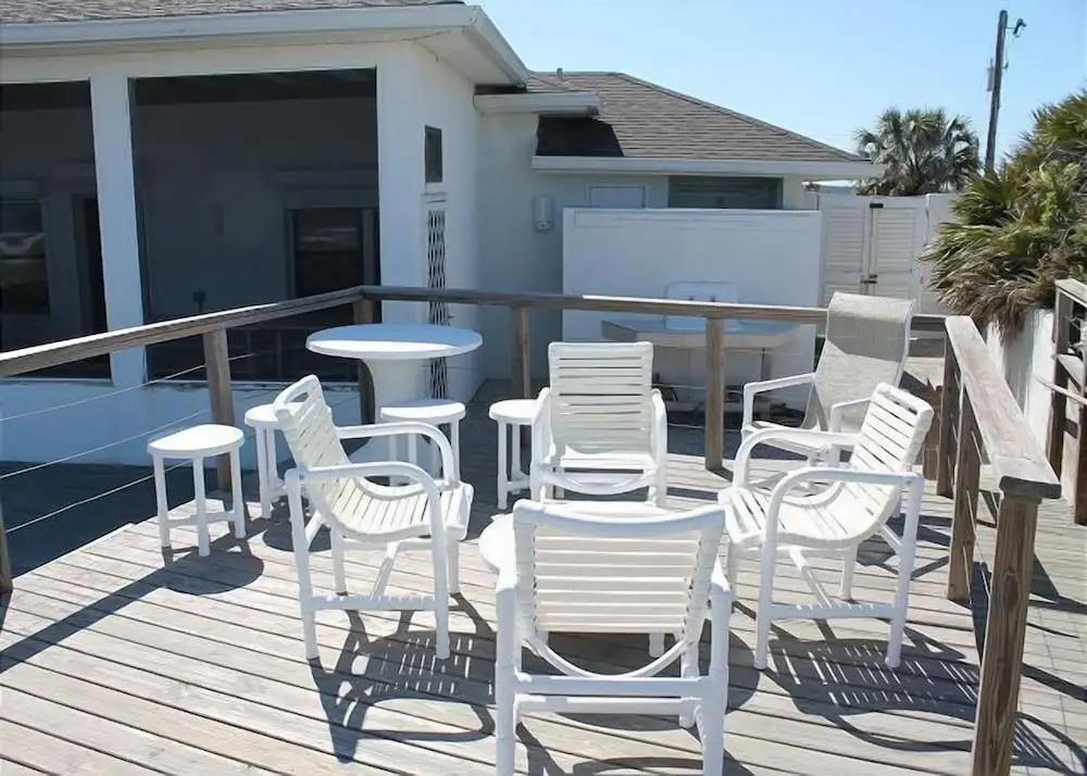 Ocean front Vacation Home with a large screened-in Patio by RedAwning