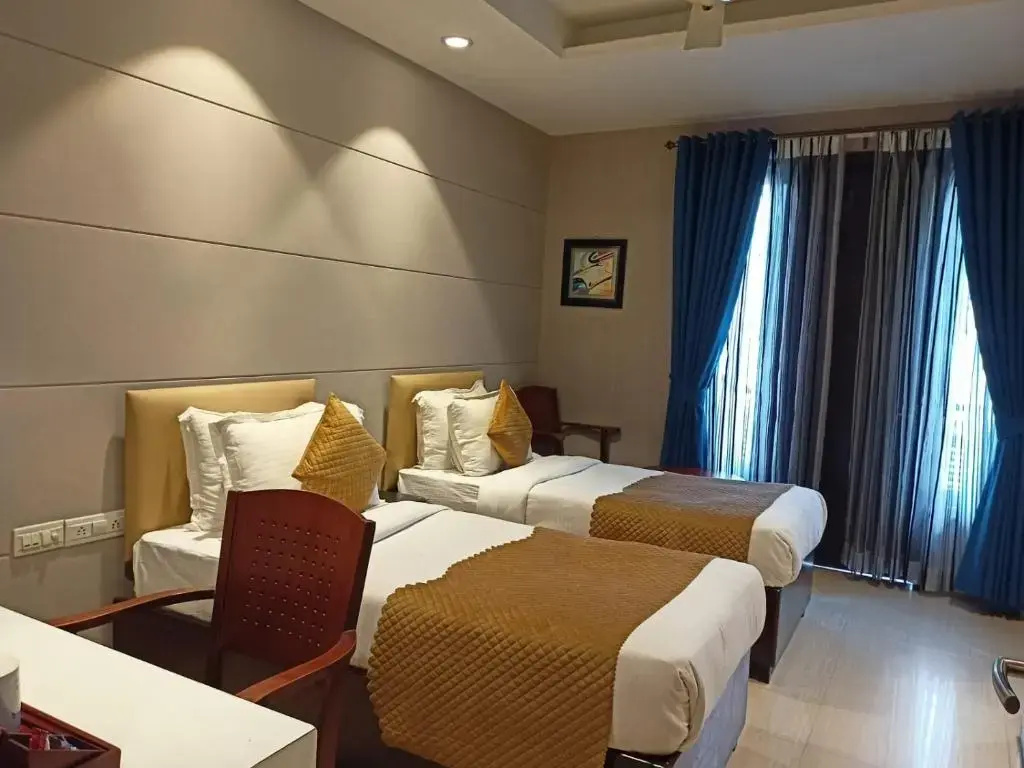 Cosy Grand @Chanakyapuri by The Cosy Hotels. - Chambres