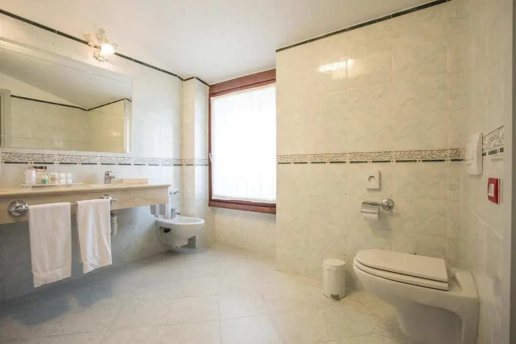 Hotel Spiaggia d'Oro - Charme & Boutique by Double Hospitality - Chambres
