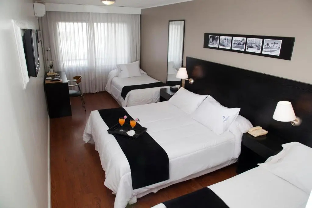 Pocitos Plaza Hotel - Chambres