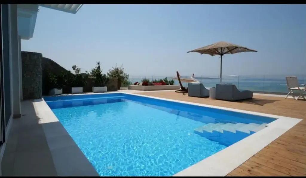 Paralia Luxury Suites - Chambres