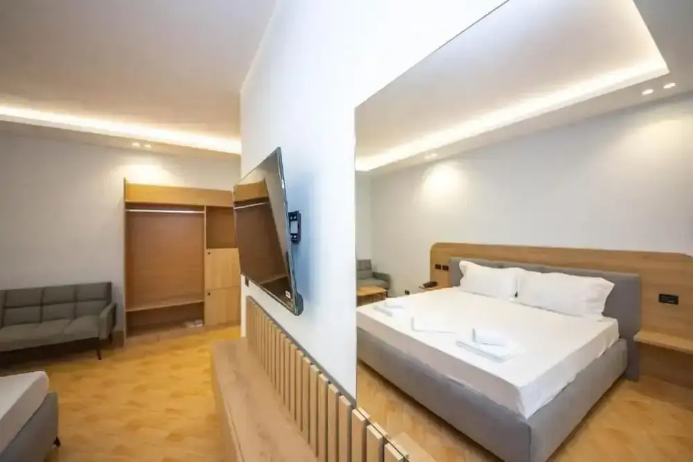 Deluxe Triple room with balcony and with sea view
