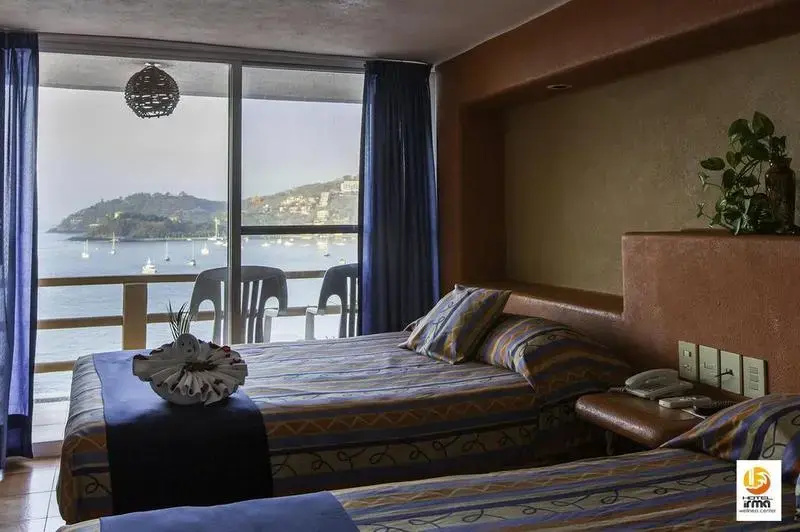 Standard Triple room with sea view