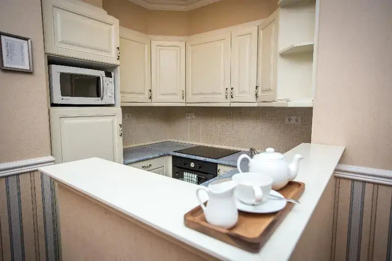 Queen's Court Hotel & Residence - Chambres