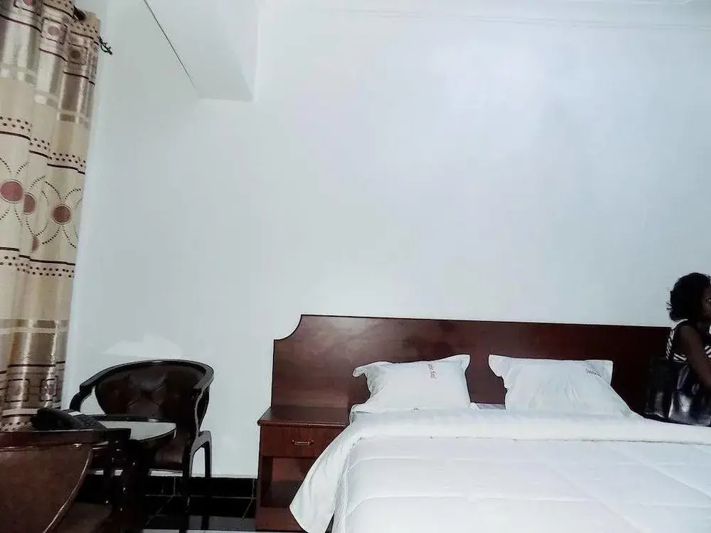 Sunrise Hotel - Chambres