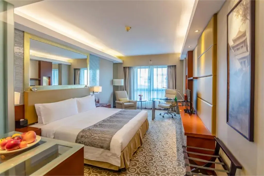 Guo Ji Yi Yuan Hotel - Chambres