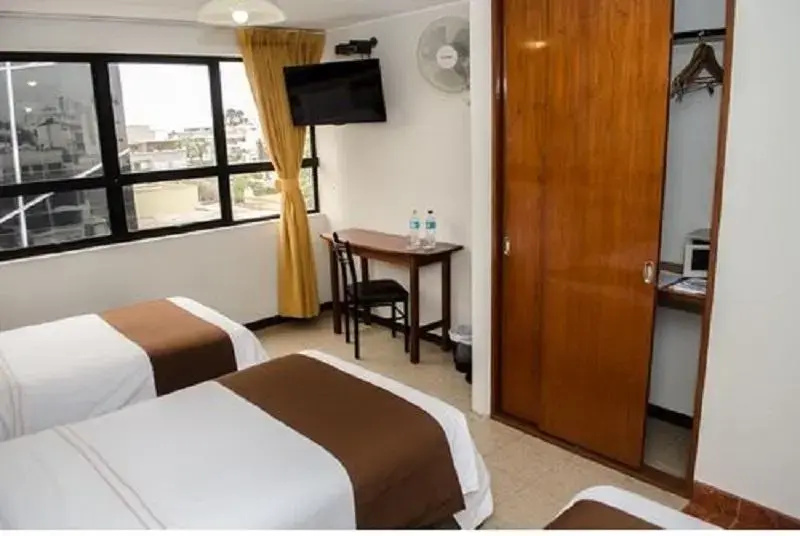 Miraflores Suites Centro - Chambres