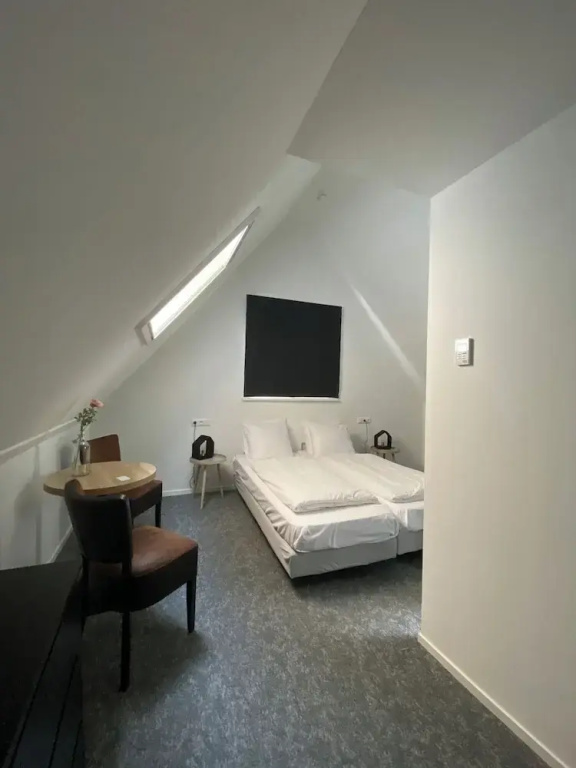 Hotel De Stadsherberg - Chambres