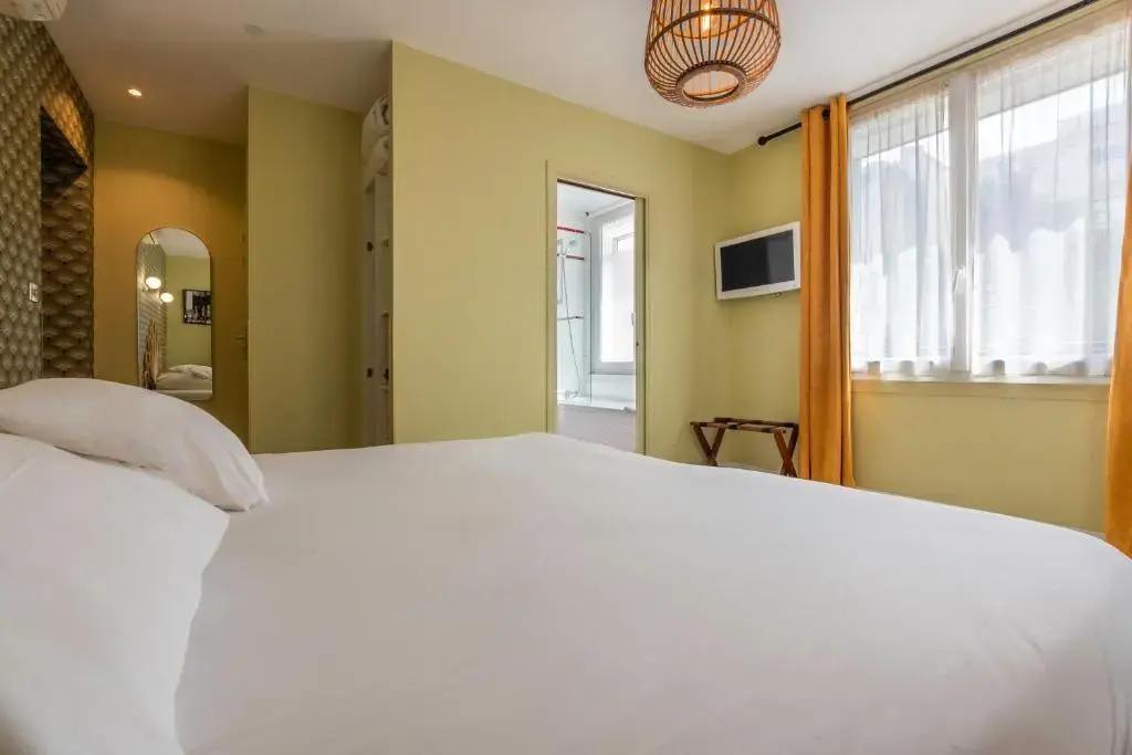 Hôtel Cosmopolitain - Chambres