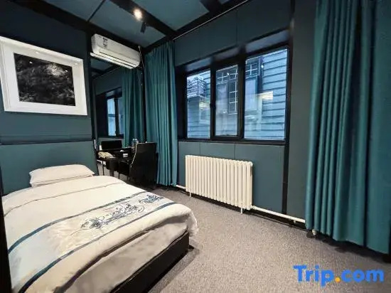 Yema Silk Road Inn - Chambres