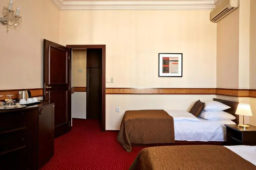 Fleur De Lis Hotel - Chambres